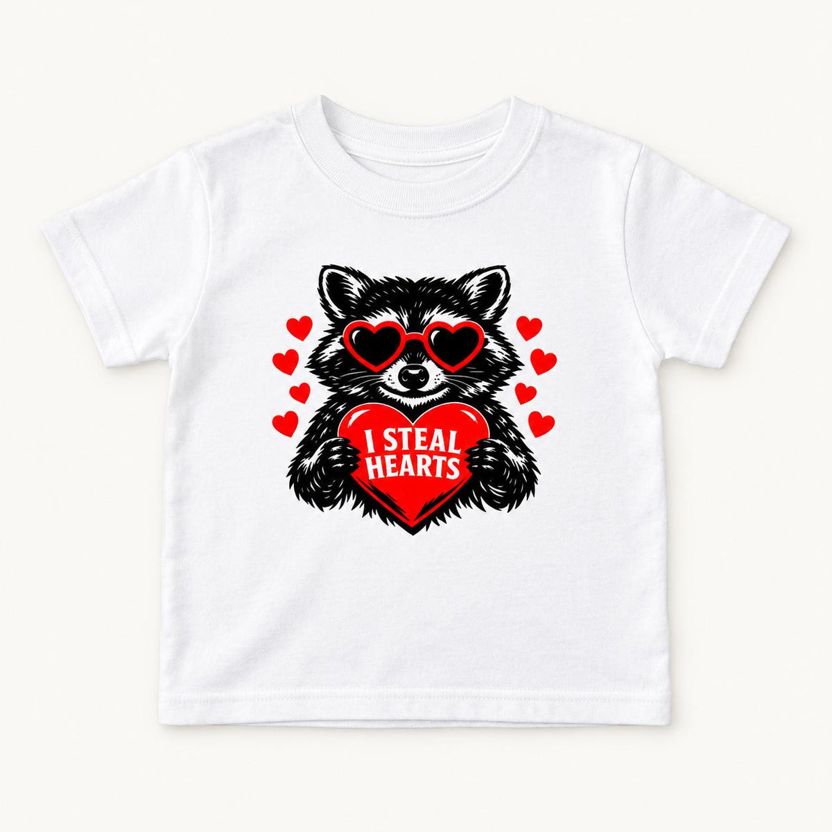 I Steal Hearts Raccoon — garment mockup or size chart