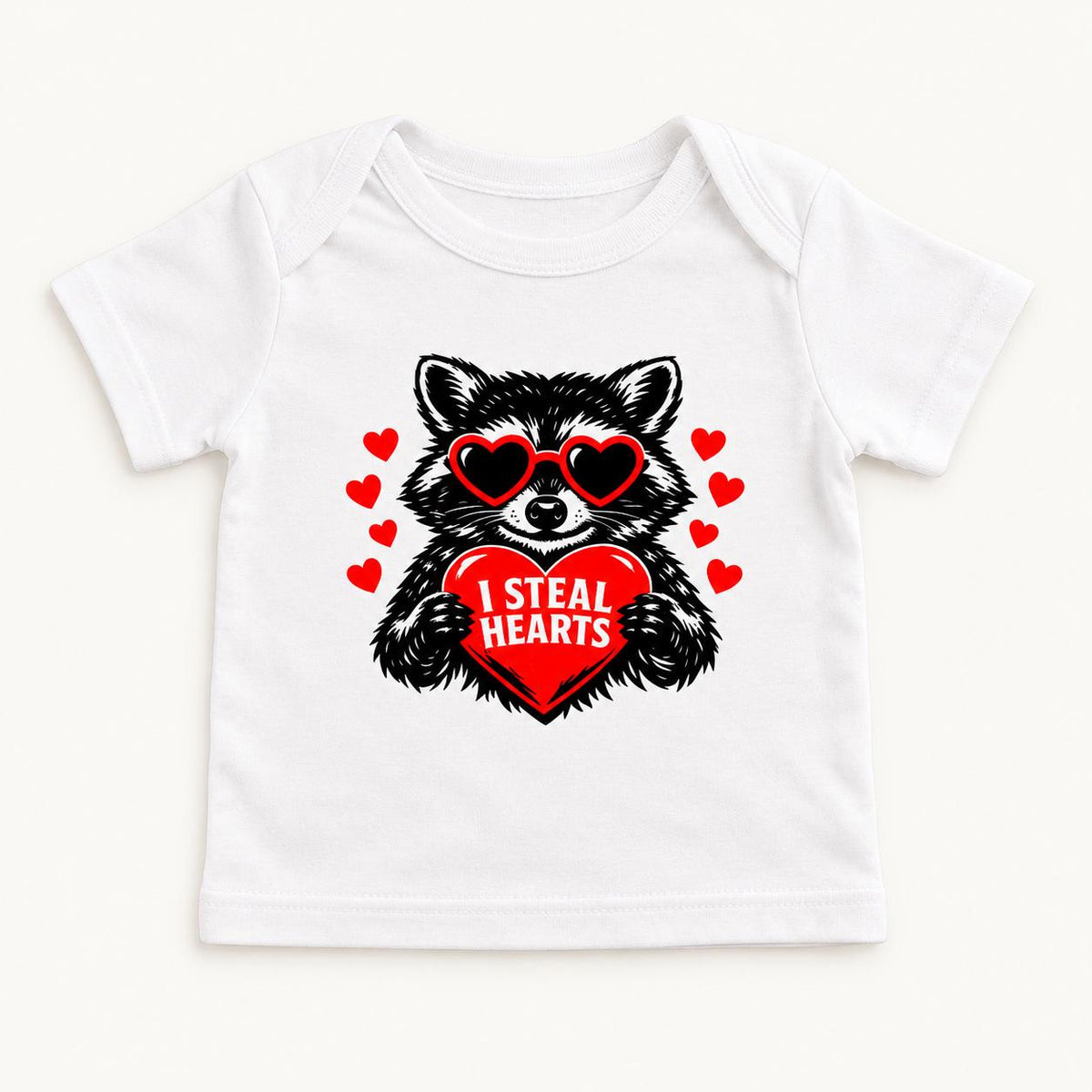 I Steal Hearts Raccoon — garment mockup or size chart
